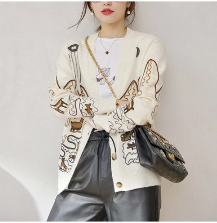     Half-length knitted cardigan coat for women with a stylish and cozy design.     