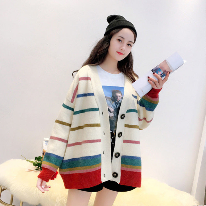 Bright and cheerful rainbow striped sweater cardigan for women, perfect for layering. 