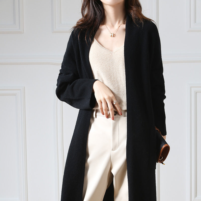 Stylish women's super long cardigan made from soft wool knit fabric. 