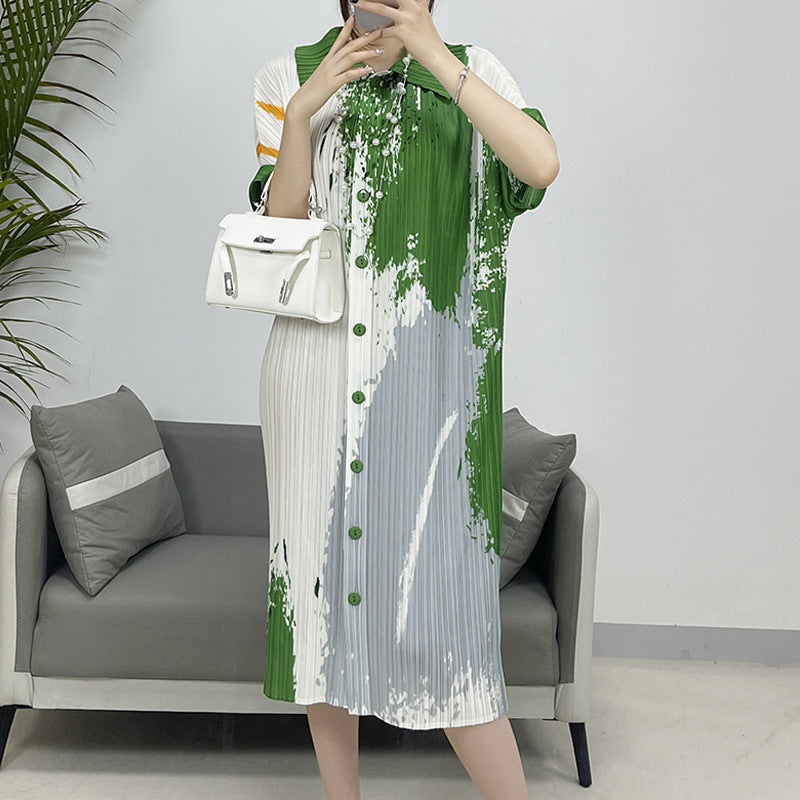 Elegant printed cardigan dress for women featuring pleated details.     